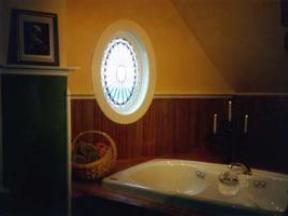 Jacuzzi Alcove with Leaded Rosette Window